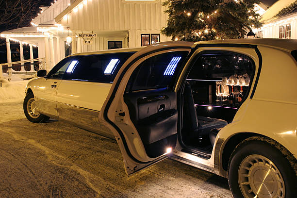 white limo with door open at night time