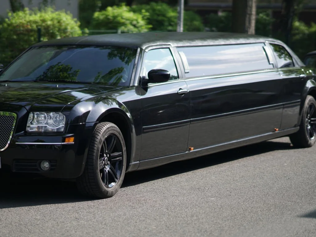 An elegant black limousine